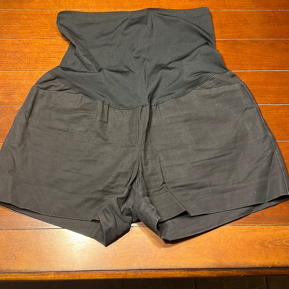 New, used once. Very comfortable and stretchy. Maternity shorts with pockets.